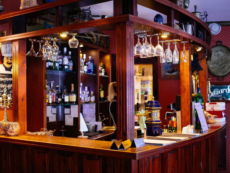 A classic bar with hanging glassware