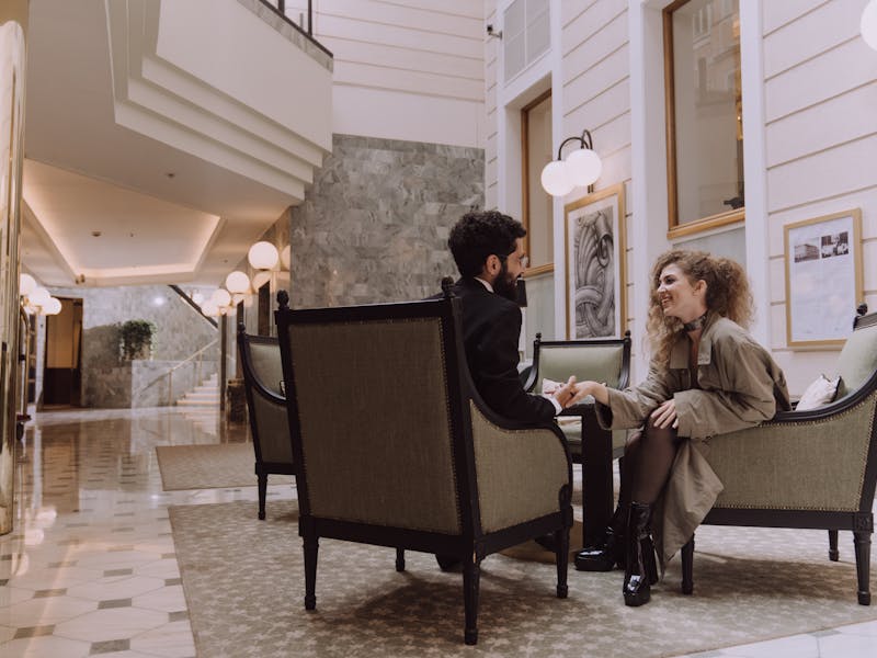 Guests relaxing in a hotel lobby